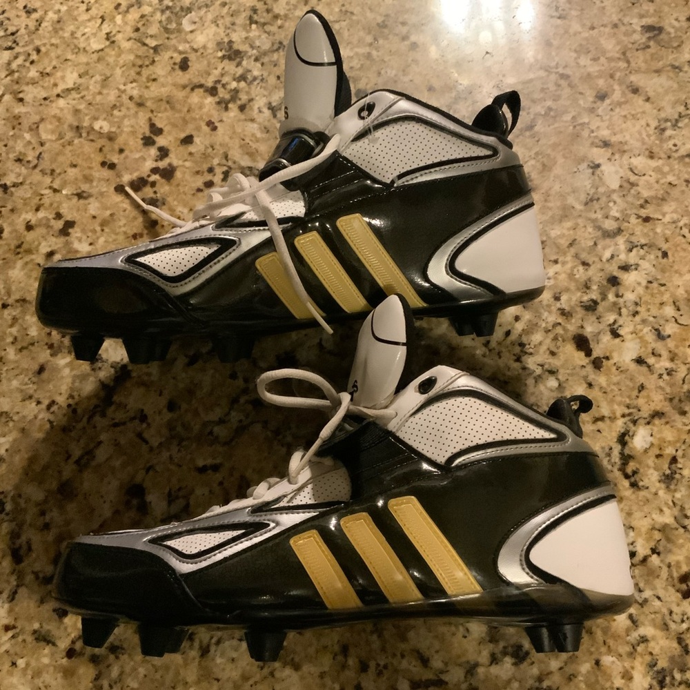 NWOB Adidas hightop Football Cleats  CLU 600001. Never used. Sz. 11.